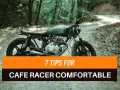 Una moto cafe racer nera su una strada sterrata nel bosco. 7 consigli per rendere confortevoli i modelli cafe racer.