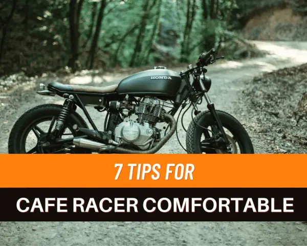 Una moto cafe racer nera su una strada sterrata nel bosco. 7 consigli per rendere confortevoli i modelli cafe racer.