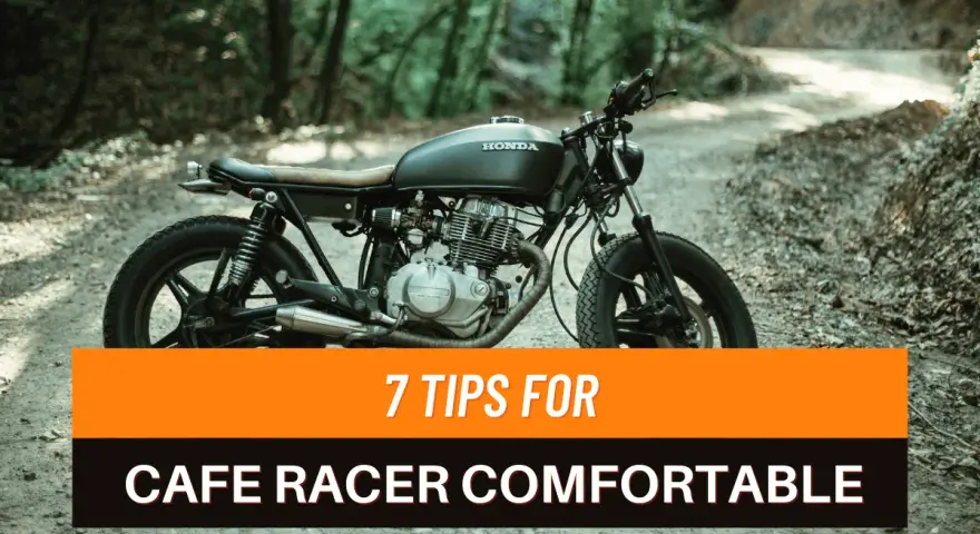 Una moto cafe racer nera su una strada sterrata nel bosco. 7 consigli per rendere confortevoli i modelli cafe racer.