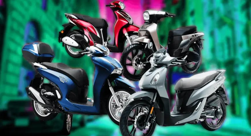Diversi scooter colorati, blu, rosso, argento e grigio, mostrano la differenza tra moto e scooter.